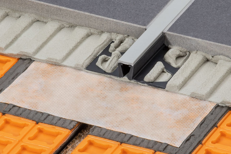 Schluter Dilex movement profile fitted in between tiles