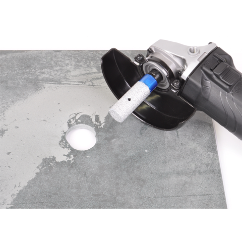 Montolit FPU Universal Diamond Milling Bit attached to Angle Grinder having enlarged a hole